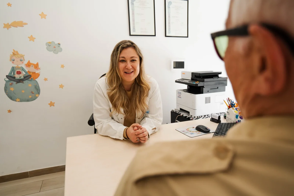 Mary welcoming someone at the speech and language therapy practice in Viterbo